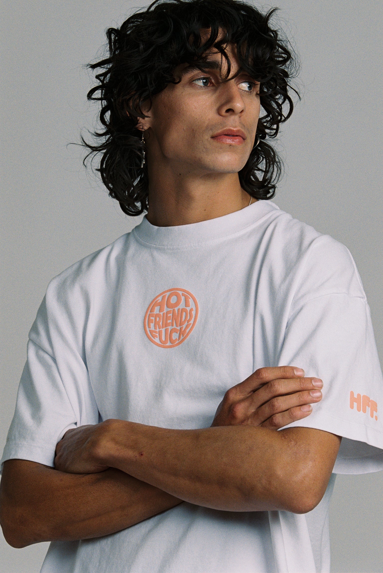 Donovan wearing the White Shirt with Salmon Pink Puff Print