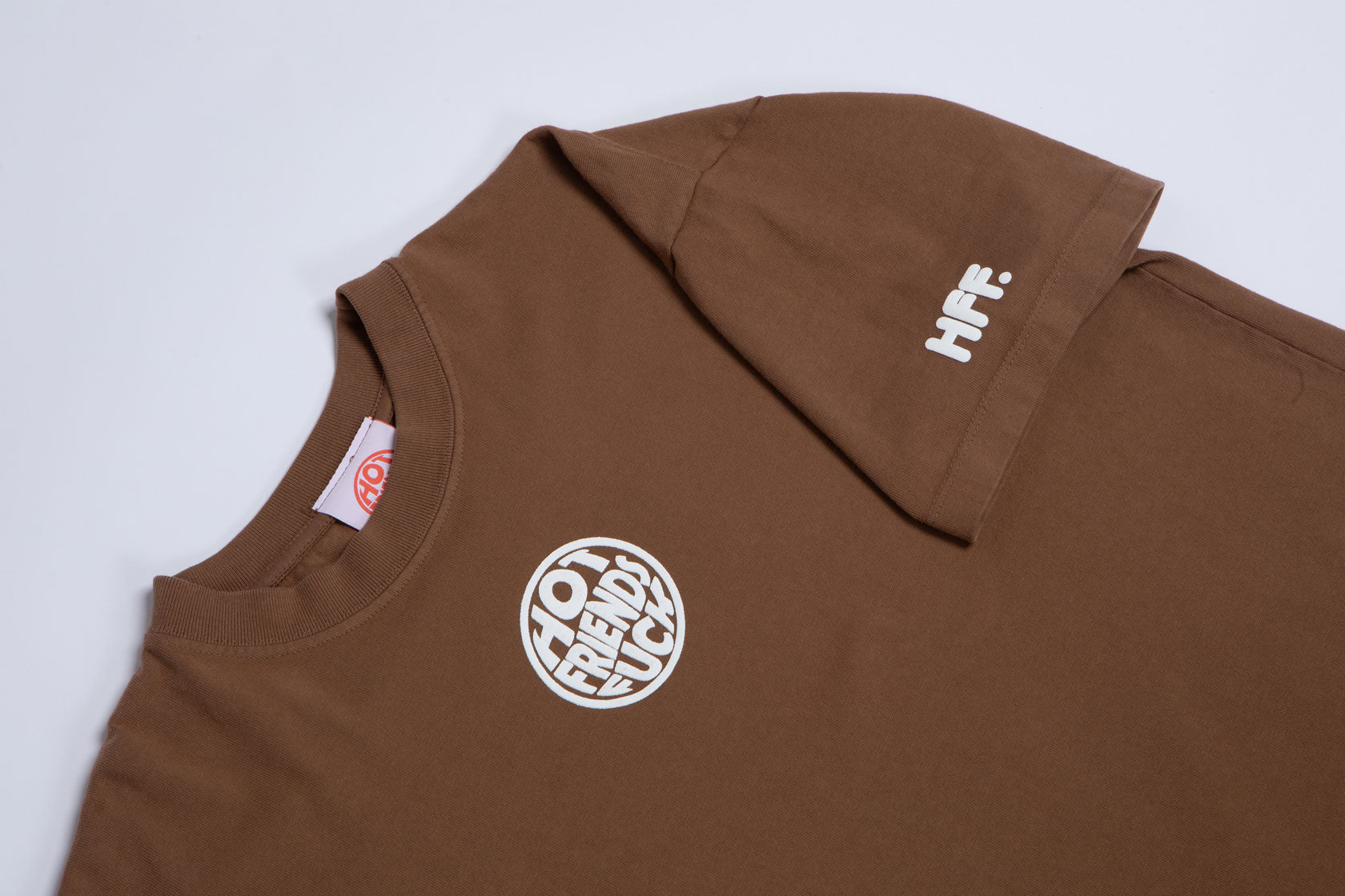 Brown Shirt with White Puff Print.
