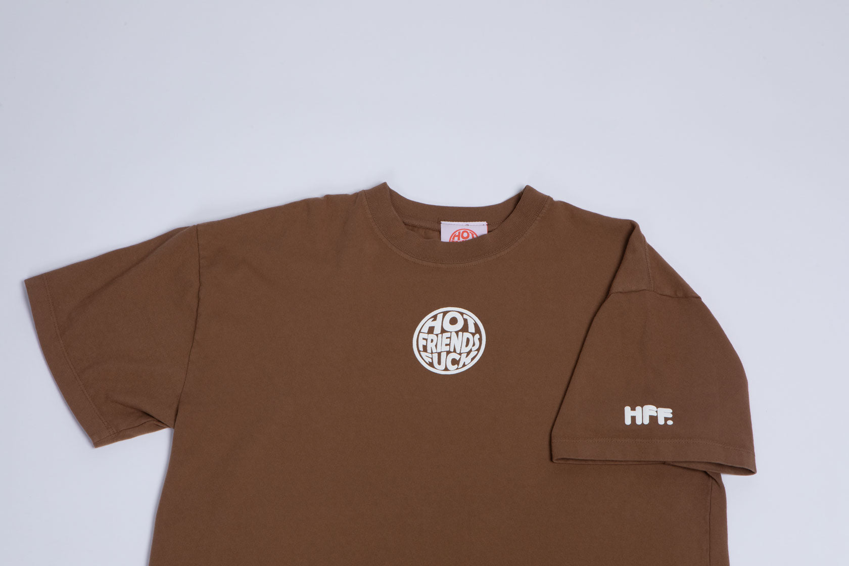 Brown Shirt with White Puff Print.