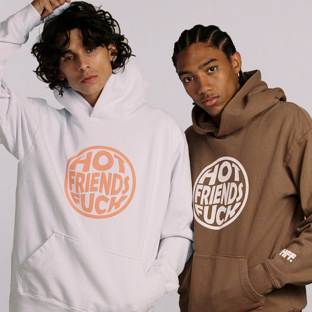 Donovan is wearing the Cream Hoodie with Salmon Pink Puff Print, and Hechan is wearing the Brown Hoodie with White Puff Print. 20oz French Terry